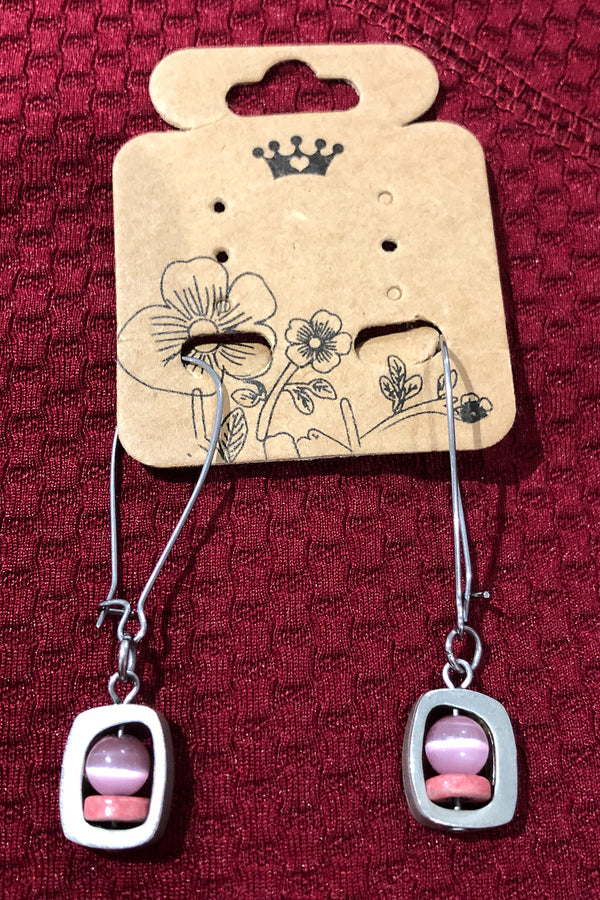 Boucle d'oreilles argent et rose seconde main Autres 