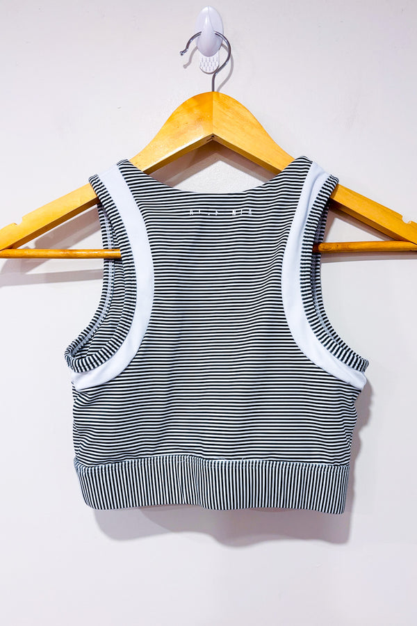 Top de sport gris et blanc rayé (xs) seconde main - All Fenix- La Penderie du Paradis