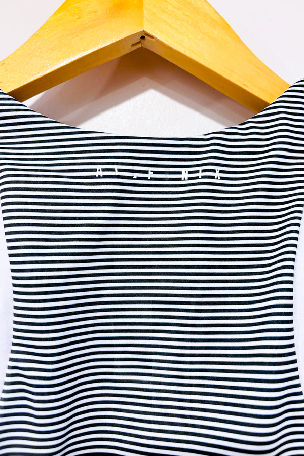 Top de sport gris et blanc rayé (xs) seconde main - All Fenix- La Penderie du Paradis