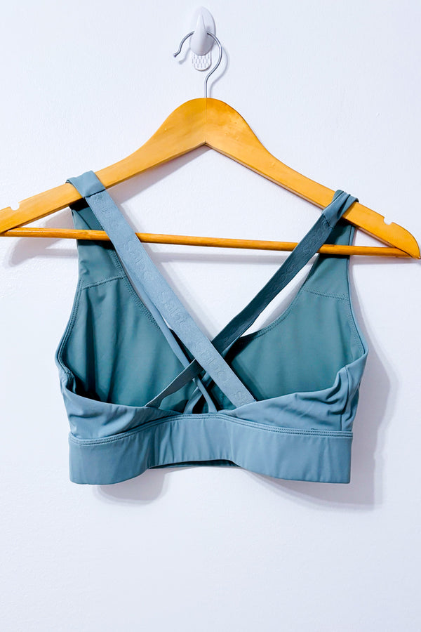 Brassière de sport bleu sauge à dos croisé seconde main - Sabē- La Penderie du Paradis