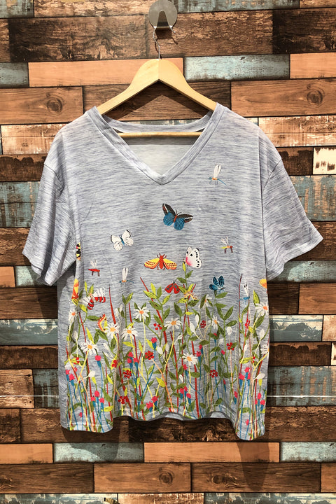 T-shirt bleu avec fleurs et papillons (xl) seconde main Misslook   