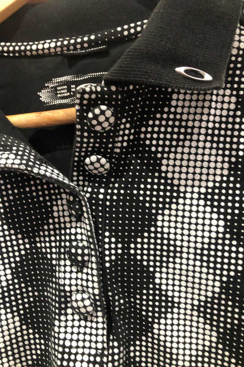 Polo noir et blanc avec motifs (m) seconde main Oakley   