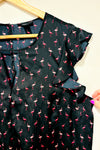 Blouse noire motif flamant rose (l) -- La Penderie du Paradis ?