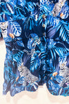 Blouse marine avec manches bouffantes et motif tropical (s)