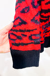 Chandail rouge et noir en tricot avec fausse fourrure (l)-Reitmans-La Penderie du Paradis 🕊