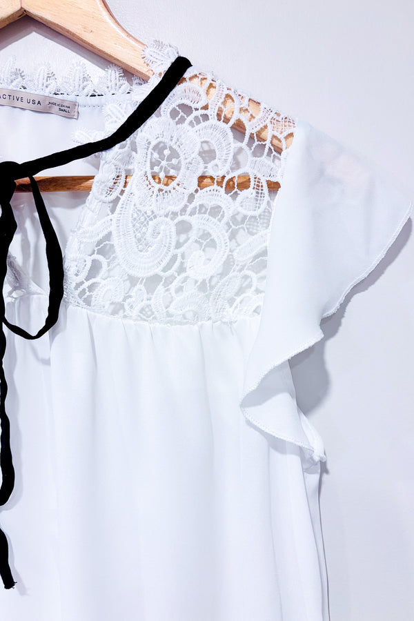 Haut fluide blanc avec broderie (s)-Active USA-La Penderie du Paradis 🕊