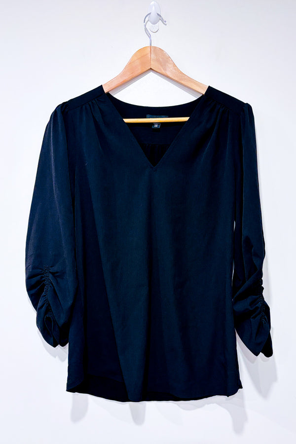 Blouse noire avec manches froncées seconde main - Le Château- La Penderie du Paradis