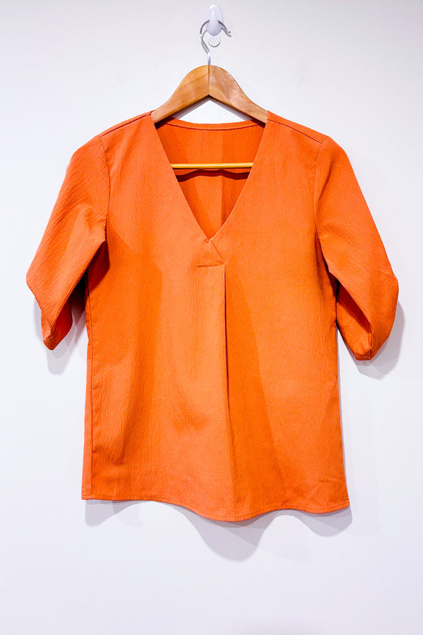 Haut orange seconde main - SHEIN- La Penderie du Paradis
