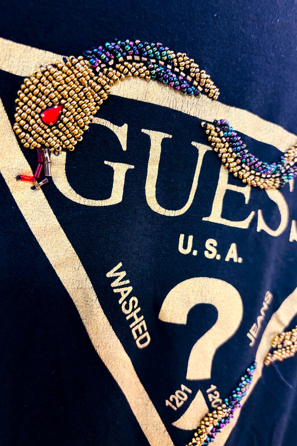 T-shirt noir avec serpent à billes seconde main - Guess- La Penderie du Paradis
