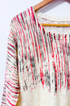 Chandail crème et rouge à ourlet asymétrique seconde main - Liky- La Penderie du Paradis