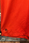 Polo de sport rouge rayé (l) seconde main Stormtech 