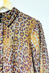 Green leopard print shirt (s)