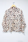 Blouse beige motif leopard avec manches bouffantes (m) -- La Penderie du Paradis ?