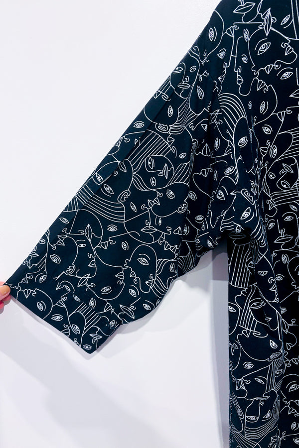 Chemise ample noire à motifs visages graphiques* seconde main - Simons- La Penderie du Paradis