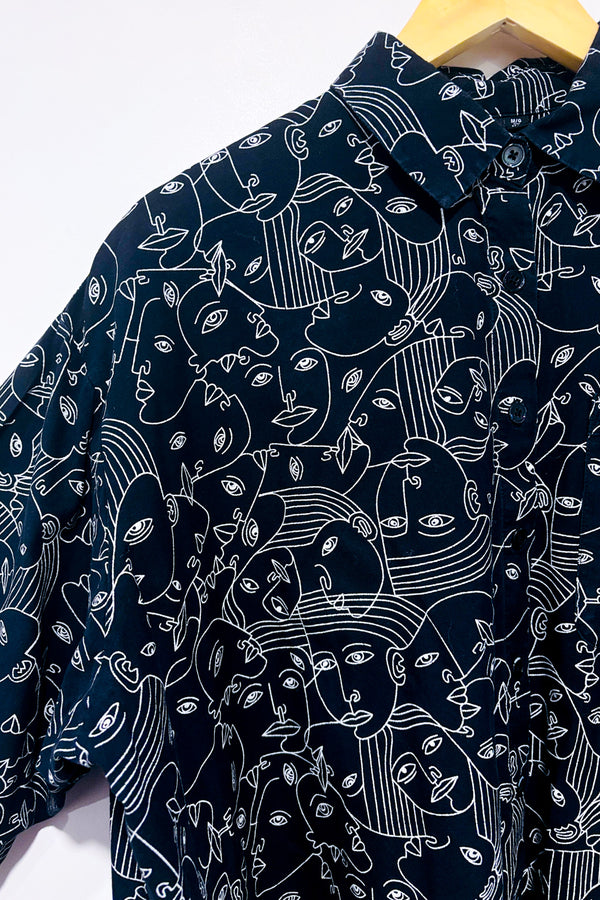 Chemise ample noire à motifs visages graphiques* seconde main - Simons- La Penderie du Paradis