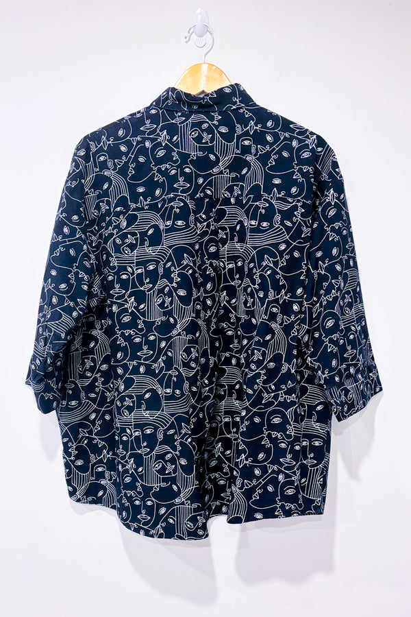 Chemise ample noire à motifs visages graphiques* seconde main - Simons- La Penderie du Paradis
