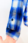 Chemise bleue à carreaux à épaules dénudées seconde main - Nygård- La Penderie du Paradis
