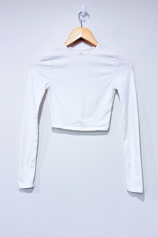 Crop top blanc à manches longue avec ouverture au dos (xs) -- La Penderie du Paradis ?