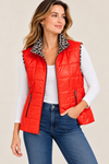Veste sans manches matelassée orange intérieur léopard seconde main - Proportion Petite / Conrad C- La Penderie du Paradis