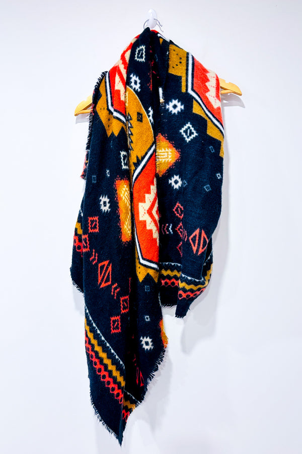 Écharpe oversized en tricot noir et orange à motifs géométriques seconde main - Misk- La Penderie du Paradis