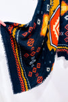 Écharpe oversized en tricot noir et orange à motifs géométriques seconde main - Misk- La Penderie du Paradis