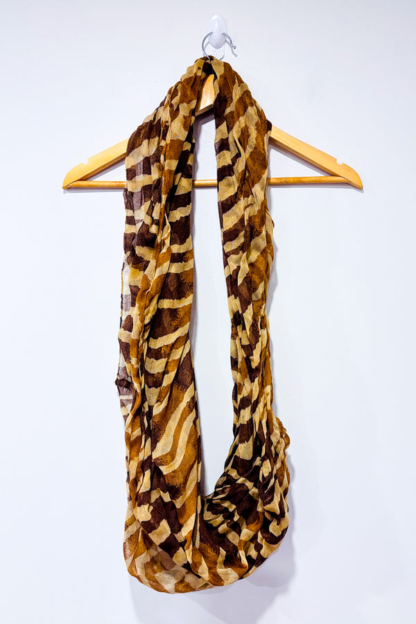 Foulard infini imprimé girafe brun et beige seconde main - Autres- La Penderie du Paradis