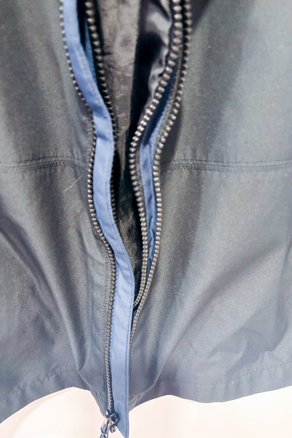 Manteau coupe-vent noir et bleu - Homme seconde main - Surface- La Penderie du Paradis