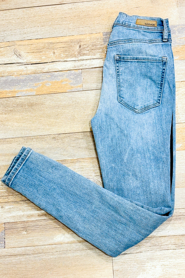 Jeans bleu pâle avec bandes noires en velours (xs) seconde main Garage 