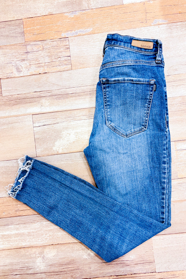 Jeans bleu pâle délavé jambe étroite (xs)-Garage-La Penderie du Paradis 🕊