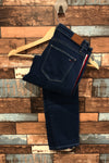 Jeans bleu foncé avec bandes rouges et blanches (s) seconde main Tommy Hilfiger 