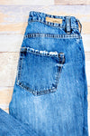 Jeans bleu effet usé jambe droite (xs)