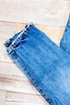 Jeans bleu effet usé jambe droite (xs)