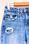 Jeans bleu effet usé jambe droite (xs)