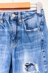 Jeans bleu effet usé jambe droite (xs)