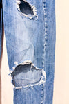 Jeans bleu effet usé jambe droite (xs)