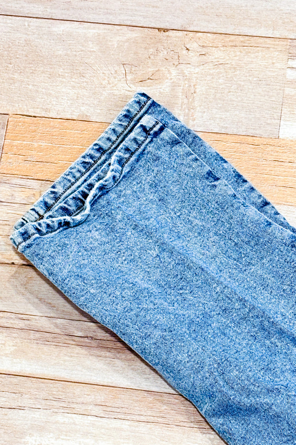 Jeans bleu pâle à taille haute seconde main - Re/Used- La Penderie du Paradis