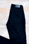 Jeans noir jambe évasée à taille régulière seconde main - Jeaniologie- La Penderie du Paradis