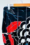 Jupe noire et rouge avec motifs (m) -- La Penderie du Paradis ?