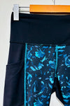 Legging noir et turquoise fleuri (s) - The North Face - La Penderie du Paradis ?