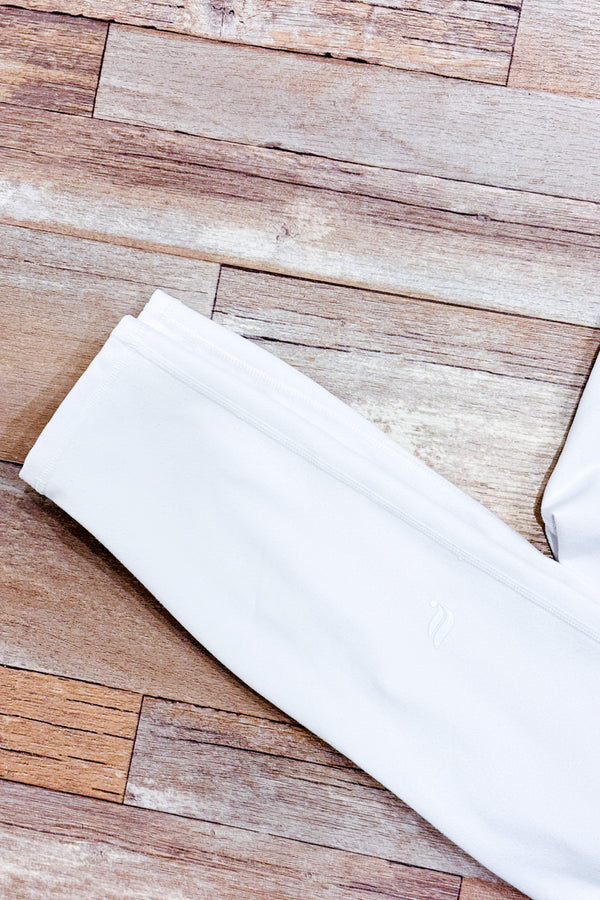 Legging blanc Define PowerHold 7/8 à taille haute seconde main - Fabletics- La Penderie du Paradis