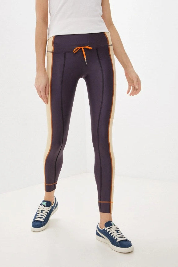 Legging sport mauve et beige color block* seconde main - Puma- La Penderie du Paradis