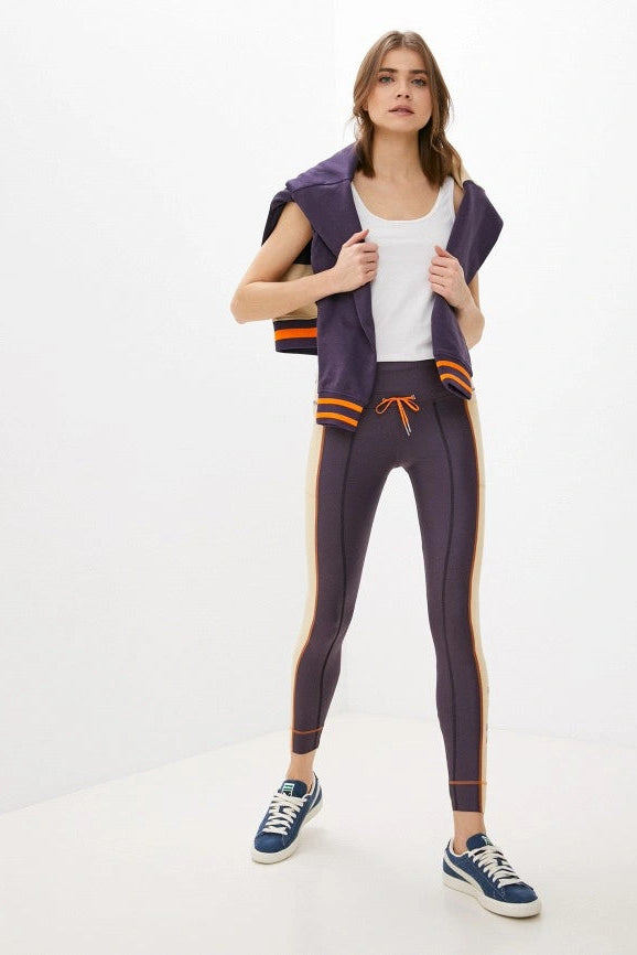 Legging sport mauve et beige color block* seconde main - Puma- La Penderie du Paradis