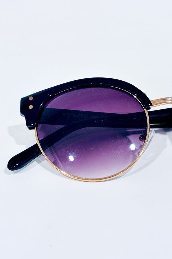 Lunettes de soleil rondes noires style rétro verres teintés violet seconde main - kstudio- La Penderie du Paradis
