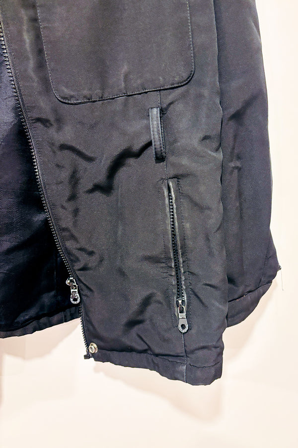 Manteau trench noir style cargo seconde main - Andrew Marc- La Penderie du Paradis