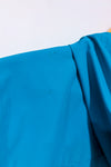 Manteau imperméable turquoise à capuchon seconde main - Outbound- La Penderie du Paradis