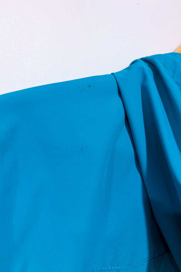 Manteau imperméable turquoise à capuchon seconde main - Outbound- La Penderie du Paradis