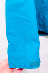 Manteau imperméable turquoise à capuchon seconde main - Outbound- La Penderie du Paradis