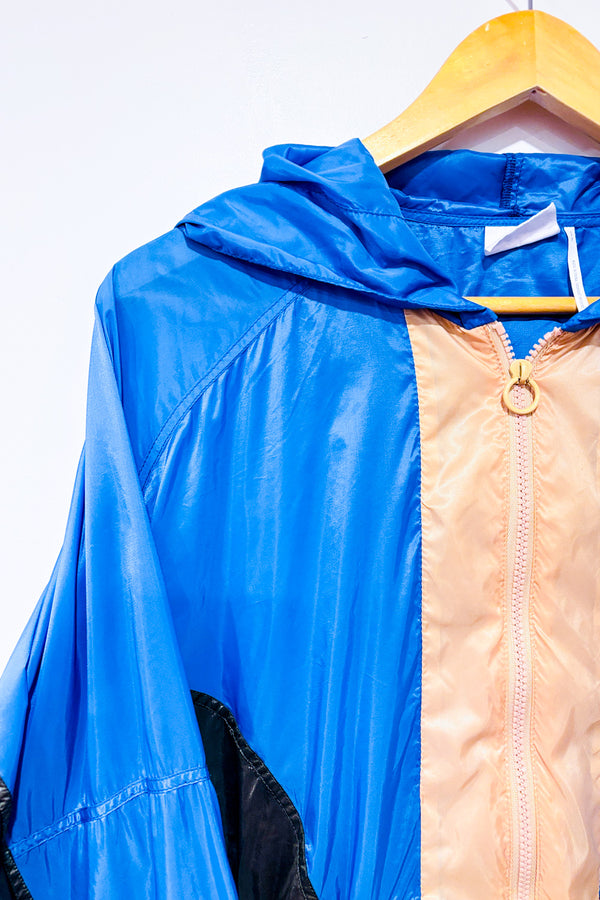 Manteau coupe-vent bleu et brun style vintage seconde main - Out From Under- La Penderie du Paradis