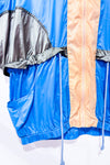 Manteau coupe-vent bleu et brun style vintage seconde main - Out From Under- La Penderie du Paradis