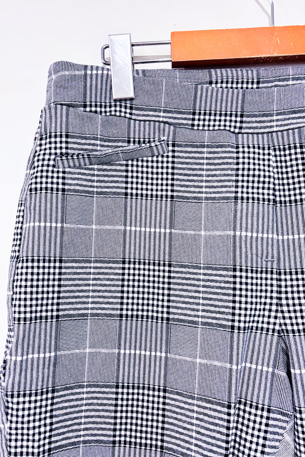 Pantalon extensible noir et blanc à carreaux jambe étroite (l)-Autres-La Penderie du Paradis 🕊